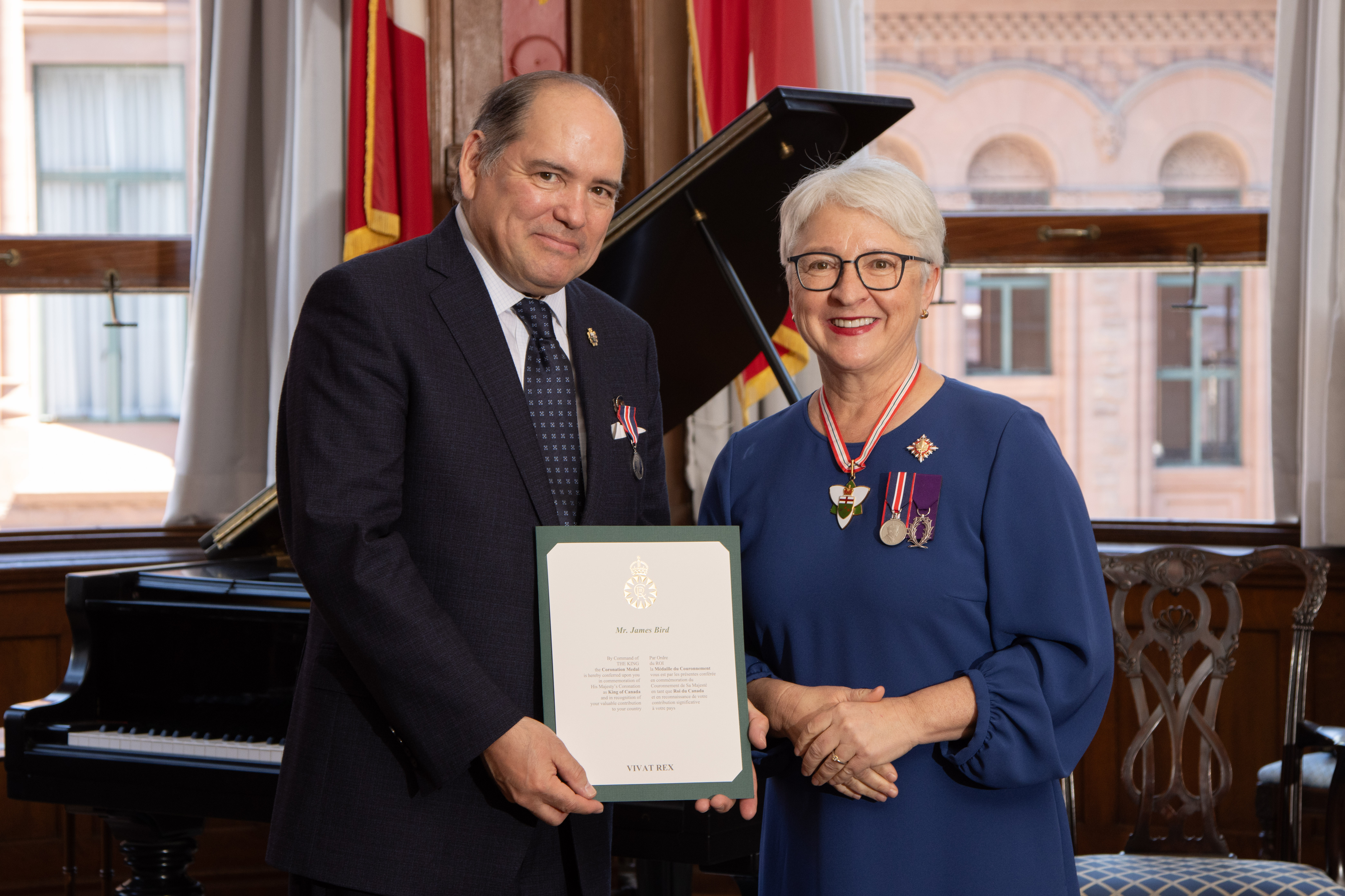 james bird with lieutenant governor receiving coronation medal